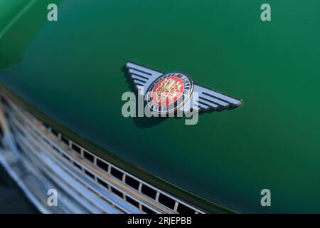 Waltershausen, Germany - June 10, 2023: Company logo on the hood of an Austin Healey Sprite Mark 4 car. Close-up. Stock Photo