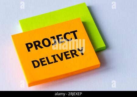 project delivery, Written on colored sticky notes, Business concept Stock Photo