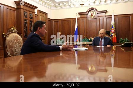 Moscow, Russia. 21st Aug, 2023. Russian President Vladimir Putin, right, listens to Moscow Region Governor Andrei Vorobyov, left, during a face-to-face meeting at the Kremlin, August 21, 2023 in Moscow, Russia. Credit: Mikhail Klimentyev/Kremlin Pool/Ģ����ý Live News Stock Photo