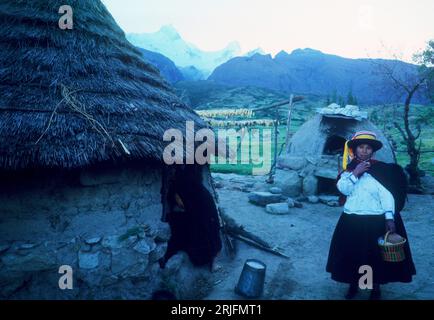 Peru. Ancash region.  Cordillera Blanca in Andes mountain range (Cordillera de los Andes). Woman of Quechua ethnic group at one of the uppermost dwellings on mount Huascarán. Stock Photo