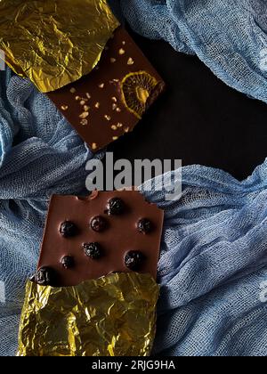 Chocolate bar in gold foil Stock Photo - Alamy