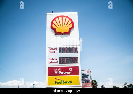 Nakuru, Kenya. 22nd Aug, 2023. Fuel prices are seen displayed on a board at a Shell fuel station in Nakuru. An analysis by Global Witness said by 2050, five major fossil fuel corporations - Shell, BP, ExxonMobil, Chevron, and TotalEnergies are set to use up an eighth of the global carbon budget, placing Paris Agreement's 1.5°C goal at grave risk. Credit: SOPA Images Limited/Alamy Live News Stock Photo