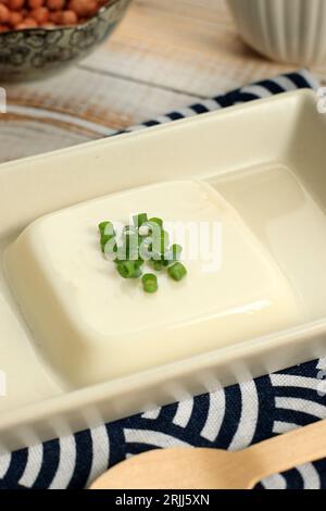 Jimami Dofu or Okinawan Tofu Pudding, Topping with Green Onion Scallion Stock Photo