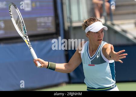 Victorija Golubic of Switzerland returns ball during 1st round match against Mary Stoiana of USA of qualifying for US Open Championship at Billy Jean King Tennis Center in New York on August 22, 2023 Stock Photo