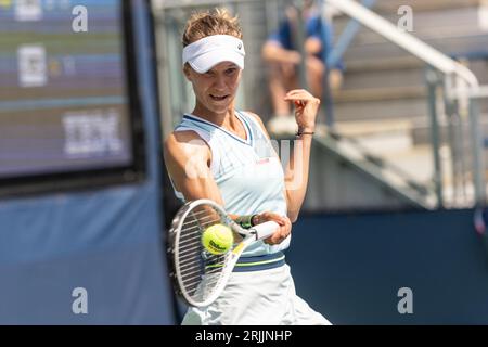 Victorija Golubic of Switzerland returns ball during 1st round match against Mary Stoiana of USA of qualifying for US Open Championship at Billy Jean King Tennis Center in New York on August 22, 2023 Stock Photo