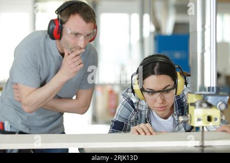 wood industry technicians working together on project Stock Photo