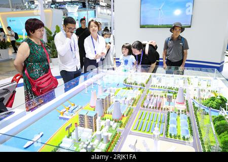 People visit the 7th China-South Asia Expo in Kunming City, southwest China's Yunnan Province, 20 August, 2023. Stock Photo