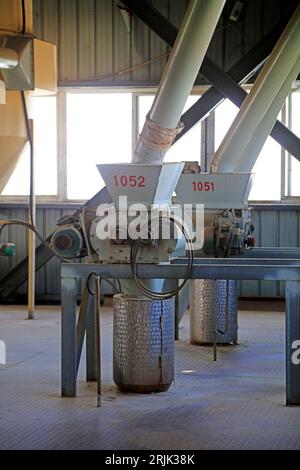 Machinery and equipment in rice processing plant Stock Photo