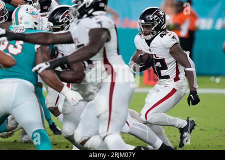 Miami Dolphins defensive tackle Brandon Pili (96) celebrates after making a  tackle during the second half of a preseason NFL football game against the  Atlanta Falcons, Friday, Aug. 11, 2023, in Miami