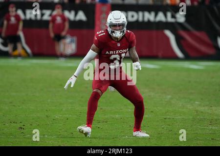 Arizona Cardinals cornerback Antonio Hamilton Sr., right, celebrates after  intercepting a pass with safety Andre Chachere during the second half of an  NFL preseason football game against the Denver Broncos in Glendale