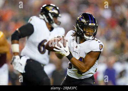 Baltimore Ravens running back Keaton Mitchell outruns Washington