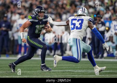 Seattle Seahawks quarterback Holton Ahlers looks to pass against the Dallas  Cowboys during the first half of a preseason NFL football game Saturday,  Aug. 19, 2023, in Seattle. (AP Photo/Stephen Brashear Stock