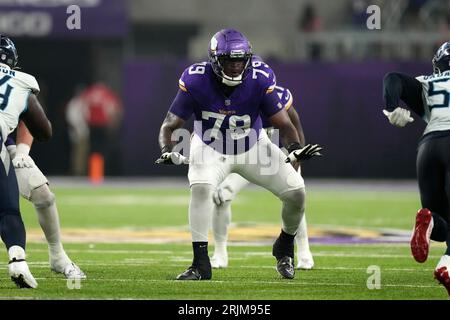 Minnesota Vikings offensive tackle Vederian Lowe leaves the field after  their loss to the Las Vegas Raiders in an NFL preseason football game,  Sunday, Aug. 14, 2022, in Las Vegas. (AP Photo/John