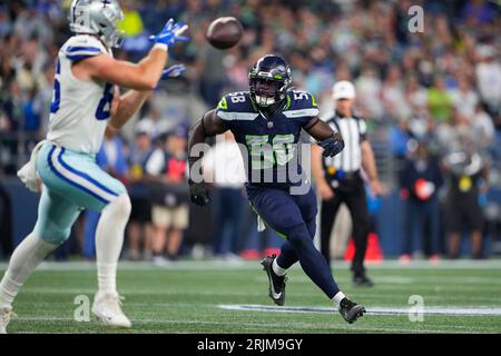 Seattle Seahawks linebacker Derick Hall (58) walks on the field during the  NFL football team's rookie minicamp, Friday, May 12, 2023, in Renton, Wash.  (AP Photo/Lindsey Wasson Stock Photo - Alamy