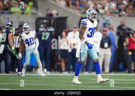 A fan waves a Dallas Cowboys flag before a preseason NFL football game  between the Seattle Seahawks and the Cowboys, Saturday, Aug. 19, 2023, in  Seattle. (AP Photo/Lindsey Wasson Stock Photo - Alamy