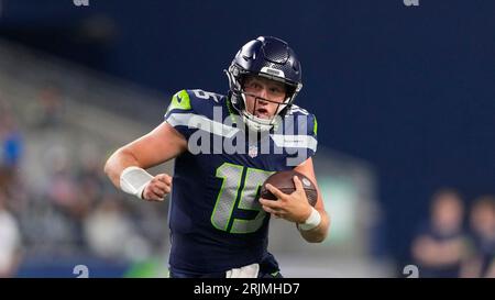 Seattle Seahawks quarterback Holton Ahlers looks to pass against the Dallas  Cowboys during the first half of a preseason NFL football game Saturday,  Aug. 19, 2023, in Seattle. (AP Photo/Stephen Brashear Stock