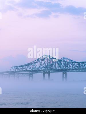 The Bridge at Dawn over the Mississippi River in New Orleans. Stock Photo