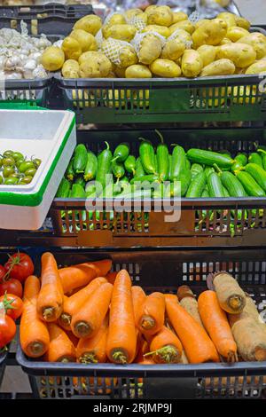 Potato Courgette Carrots Vegetables in Plastic Trays Food Shop Stock Photo