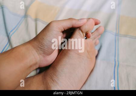Dry and cracked heels feet. Unhealthy skin from weather which need moisturizer Stock Photo