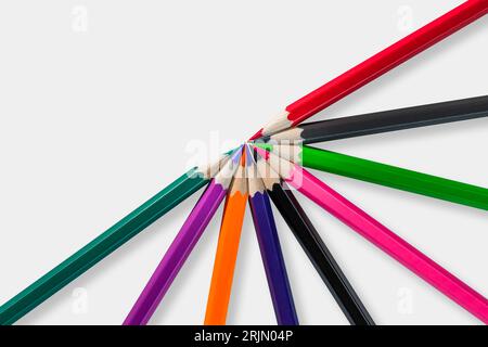 Some colored pencils of different colors on a white background ready to paint. Stock Photo