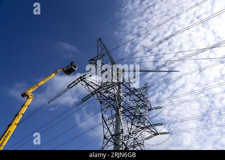 LELYSTAD - Work on the cables of the high-voltage pylons in Flevoland after the major power failure. Earlier, a fire broke out in the Lelystad high-voltage substation after a short circuit, which was caused by human error. This caused a power outage that affected a large part of the province. ANP SANDER KONING netherlands out - belgium out Stock Photo