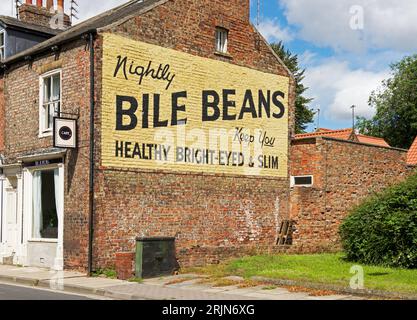 Old Bile Beans advertising mural on end of terraced house, York, North Yorkshire, England, UK Stock Photo