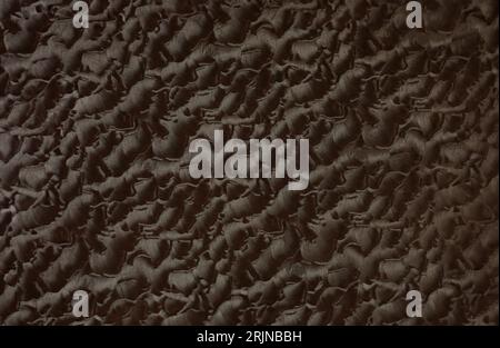 Artificial textured leather background synthetics closeup Stock Photo