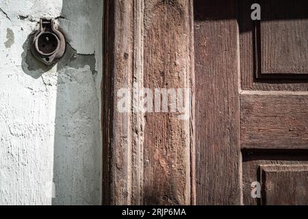 Detail of old wooden door from mill Stock Photo