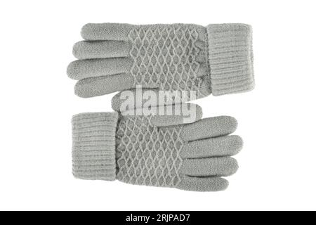 Top view of two gray knitted female gloves isolated on white background. Copy space. Stock Photo