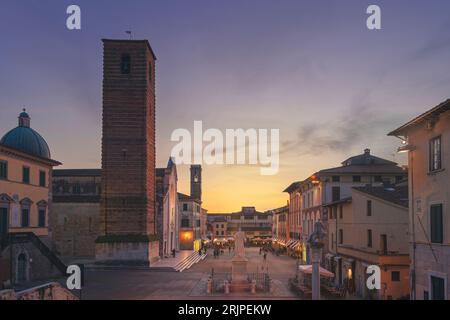 Pietrasanta old town view at sunset, main square, San Martino cathedral and Torre Civica. Versilia, province of Lucca, Tuscany region, Italy, Europe Stock Photo