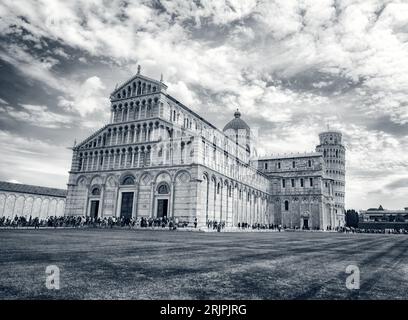 italy, Pisa, 30 -04-2023: LANDSCAPE Piazza del Duomo with famous cathedral and tilting tower. Pisa, Italy Stock Photo