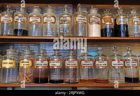 C R Clowes & Son Ltd, Victorian chemist shop interior bottles, 4 Cavendish Circus, Buxton, High Peak, Derbyshire, England, UK,  SK17 6AX Stock Photo