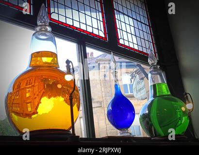 C R Clowes & Son Ltd, Victorian chemist shop interior bottles, 4 Cavendish Circus, Buxton, High Peak, Derbyshire, England, UK,  SK17 6AX Stock Photo