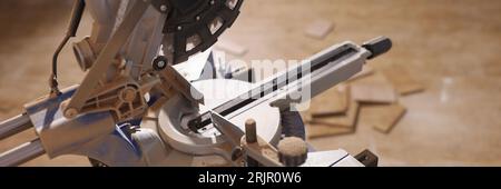 Electric circular saw on stand for cutting tiles close up. Stock Photo