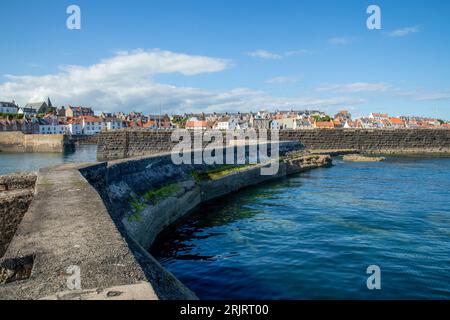 A scenic view of Saint Monan's pier with buildings in the background, Scotland Stock Photo