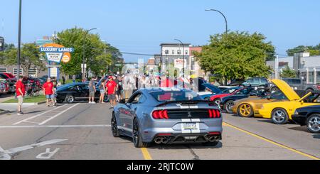 FERNDALE, MI/USA - AUGUST 16, 2023: Ford Mustang cars, at Mustang Alley near Luxury Lanes, on the Woodward Dream Cruise route. Stock Photo