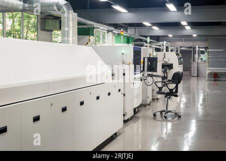 production line for printed circuit board, automatic chip mounter Stock Photo
