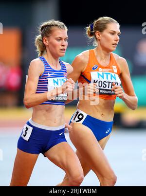 Great Britain's Megan Keith (left) and Netherlands' Maureen Koster in action as they compete in heat one of the Women's 5000 metres on day five of the World Athletics Championships at the National Athletics Centre, Budapest, Hungary. Picture date: Wednesday August 23, 2023. Stock Photo