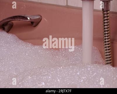 Overflow bubble bath hi-res stock photography and images - Alamy