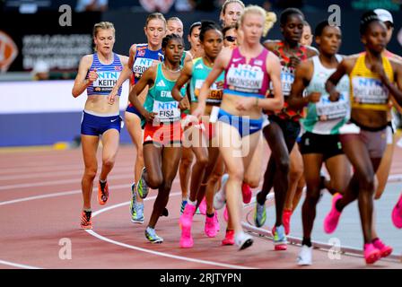 Great Britain's Megan Keith (left) in action in heat one of the Women's 5000 metres on day five of the World Athletics Championships at the National Athletics Centre, Budapest, Hungary. Picture date: Wednesday August 23, 2023. Stock Photo