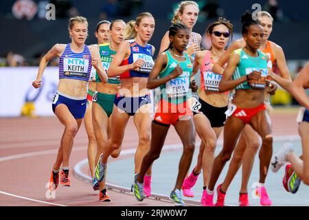 Great Britain's Megan Keith (left) in action in heat one of the Women's 5000 metres on day five of the World Athletics Championships at the National Athletics Centre, Budapest, Hungary. Picture date: Wednesday August 23, 2023. Stock Photo