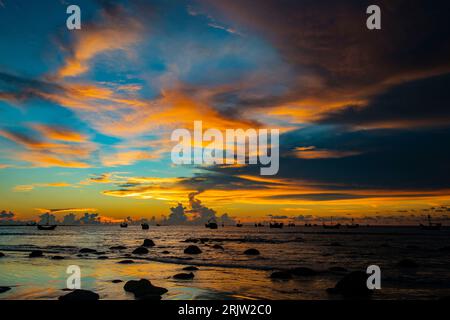 Sunrise on the Bay of Bengal at the Saint Martin's Island, locally known as Narkel Jinjira, is the only coral island and one of the most famous touris Stock Photo