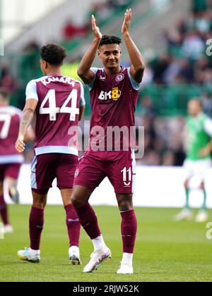 Aston Villa's Ollie Watkins (centre) celebrates scoring their side's fourth goal of the game and hat-trick during the first leg of the UEFA Europa Conference League play off match at Easter Road, Edinburgh. Picture date: Wednesday August 23, 2023. Stock Photo