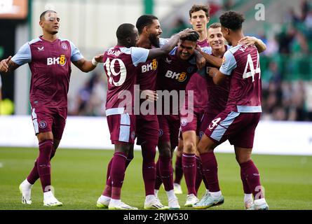 Aston Villa's Ollie Watkins (centre) celebrates scoring their side's fourth goal of the game and hat-trick with team-mates during the first leg of the UEFA Europa Conference League play off match at Easter Road, Edinburgh. Picture date: Wednesday August 23, 2023. Stock Photo