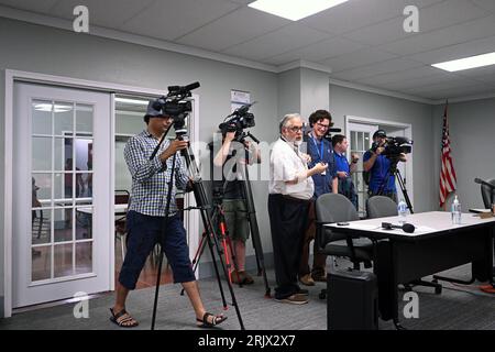 MARION, KANSAS - AUGUST 21, 2023  A much larger then usual group of media records the Marion City Kansas City council meeting Stock Photo