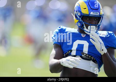 Los Angeles Rams linebacker Byron Young (0) celebrates during an