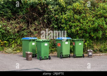 Domestic wheelie bins waiting to be collected in West Cork, Ireland. Stock Photo