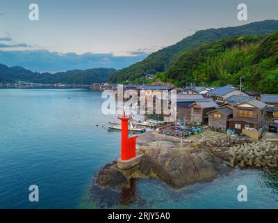 Kyoto, Japan with Funaya boathouses and the lighthouse on Ine Bay. Stock Photo