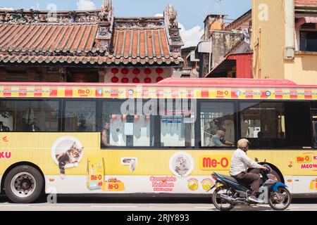 Penang, Malaysia - July 6, 2023 : Georgetown Han Jiang Ancestral Temple and local bus Stock Photo
