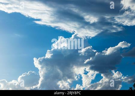 cumulo nimbus clouds in a blue sky, with a silver lining Stock Photo